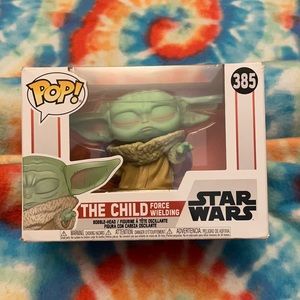 Never opened Funko POP child force wielding